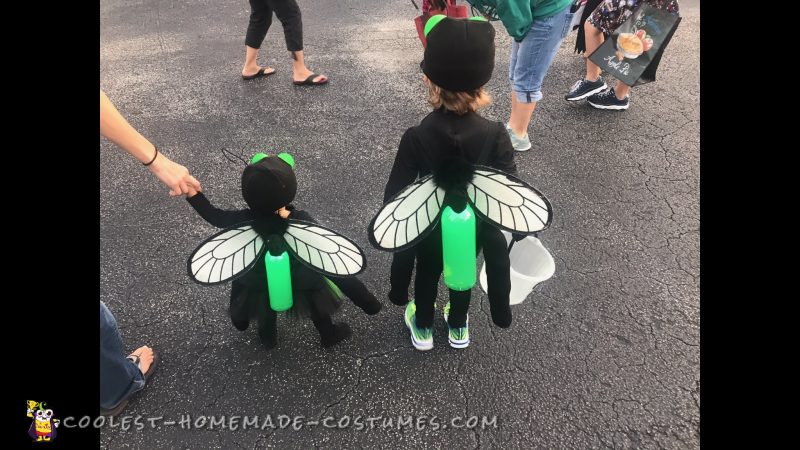 Little Girl Catching Lightning Bugs in a Jar