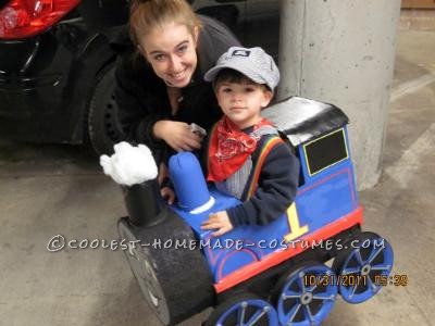 I made this train costume out of stuff I had around the house. I started out with a box for the body and painted it. The face of the train I used a p