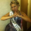 The TV show Toddlers and Tiara's was my inspiration for this Halloween Costume. To achieve this look I took an old floor length bridesmaid dress too