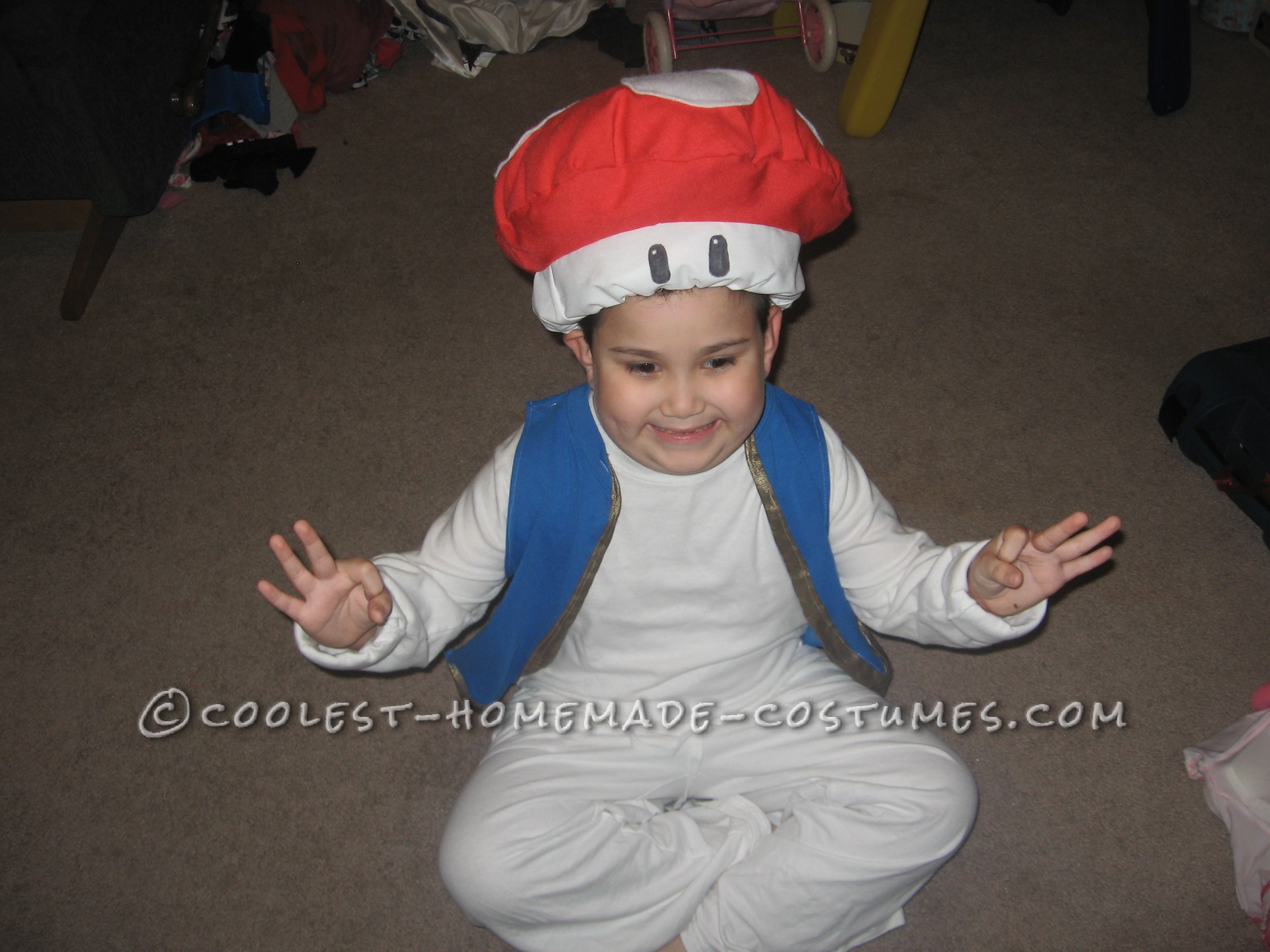 From start to finish I spent 4 hours making this toad costume.  It is made of things I found at goodwill.  It consists of a white long slee