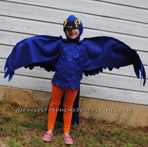 This is a blue Macaw Parrot Costume, Handmade by (Me) a stay at home mom and freelance artist
This costume is based around a blue tshirt layere