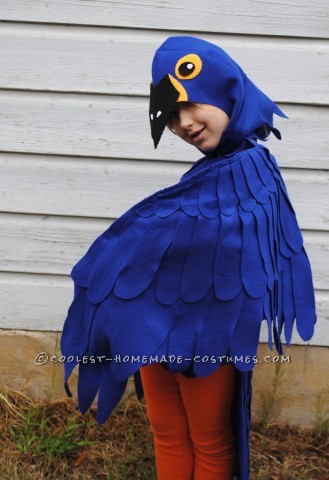 This is a blue Macaw Parrot Costume, Handmade by (Me) a stay at home mom and freelance artist
This costume is based around a blue tshirt layere