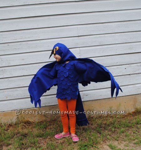 This is a blue Macaw Parrot Costume, Handmade by (Me) a stay at home mom and freelance artist
This costume is based around a blue tshirt layere