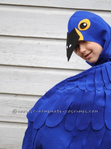 This is a blue Macaw Parrot Costume, Handmade by (Me) a stay at home mom and freelance artist
This costume is based around a blue tshirt layere
