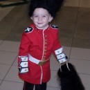 We made my three year old son a Homemade Royal English Guard Costume for Halloween. I used red material and sewed it into a long, fitt