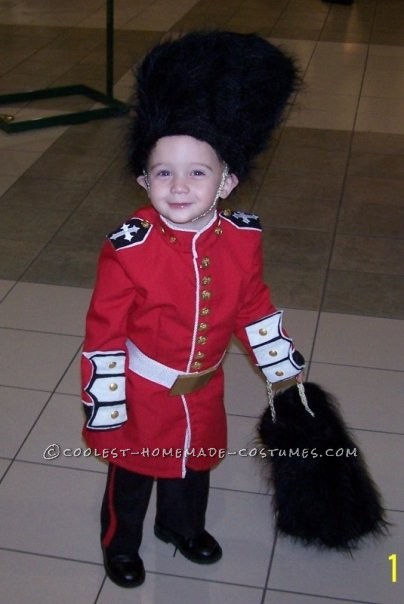 We made my three year old son a Homemade Royal English Guard Costume for Halloween. I used red material and sewed it into a long, fitt