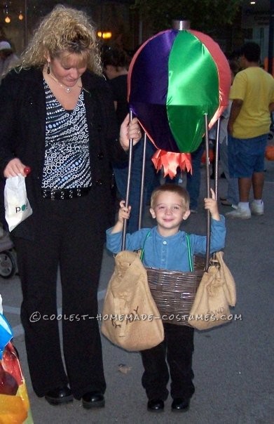 We made my son a hot air balloon a few years ago. This was one of the simplest costumes I ever tried! We created a frame from PVC pipe, painted it br