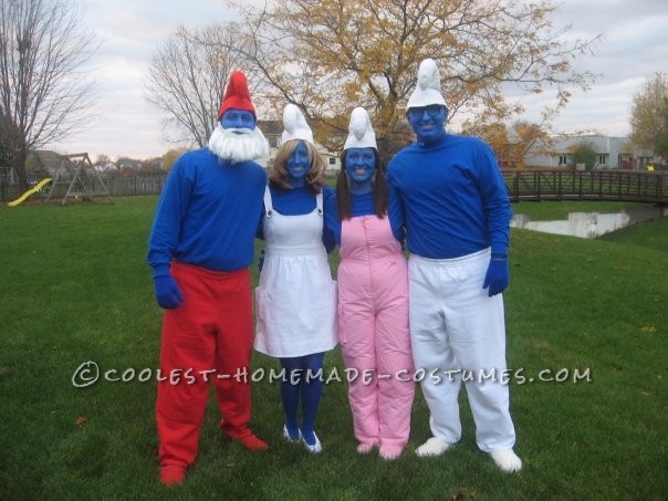 Meet the Smurfs, from Left to Right. Papa Smurf, Smurfette, Sassette Smurfling, Brainy Smurf. We love to make our own costumes, so we were able to ma