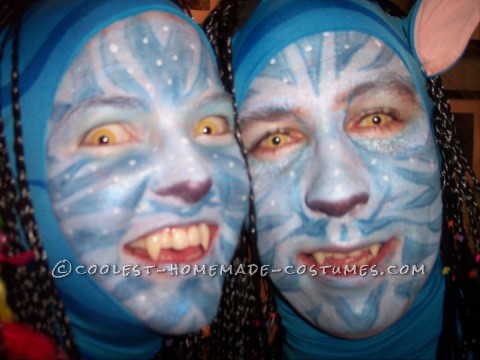 After seeing Avatar I knew right away that that was our next halloween costume!  We had custom made zaneti suits with the blue tiger stripes mad