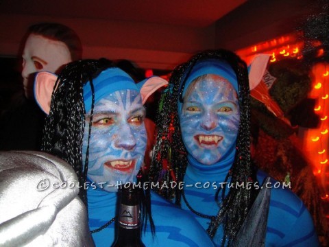 After seeing Avatar I knew right away that that was our next halloween costume!  We had custom made zaneti suits with the blue tiger stripes mad