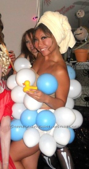 This costume was such a big hit!  I blew up blue and white balloons and safety pinned them to a flesh colored tank top and shorts.  The onl