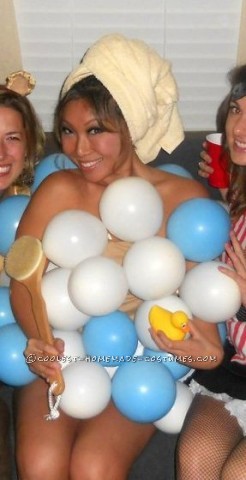 This costume was such a big hit!  I blew up blue and white balloons and safety pinned them to a flesh colored tank top and shorts.  The onl