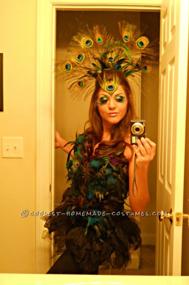 I am in love with everything peacock, so this costume was a must for me to conquer.
I ordered a plain black corset off of ebay for $15 and completel