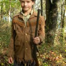 Here is my son in his Davy Crockett AKA Daniel Boone costume created by his grandmother.  She used a faux suede fabric for jacket with coor