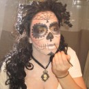I started off wanting to incorporate the popular Dia de los Muertos skull candy makeup into a halloween costume.  I was inspired by photos I fou