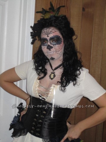 I started off wanting to incorporate the popular Dia de los Muertos skull candy makeup into a halloween costume.  I was inspired by photos I fou