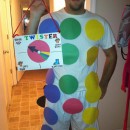 Buy a white t-shirt and white shorts or pants. This costume requires 4-10 pieces of construction paper of 4 different colors (to make the circles) an