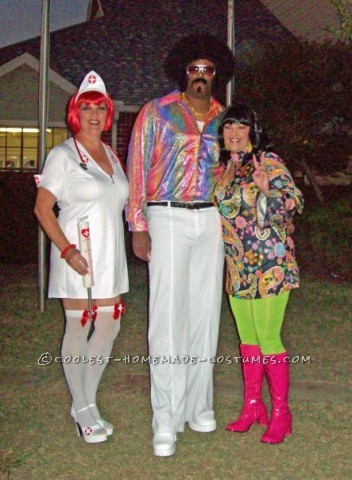 My 6ft7in tall man added height with his 4 inch white platform shoes and his 5 inch high afro. We always have to go all out with costumes. We go to t