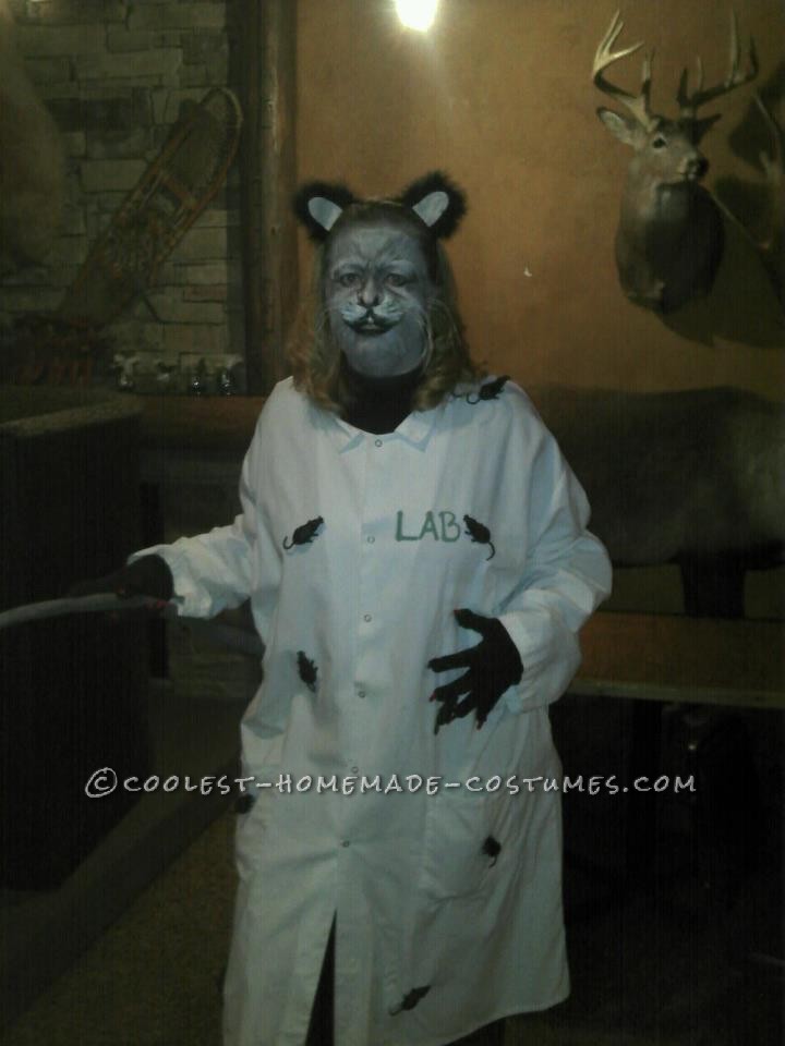 LAB RAT
  Very easy costume – I got the lab coat donated to me bye a uniform company, I pinned rats from the dollar store all over my coa