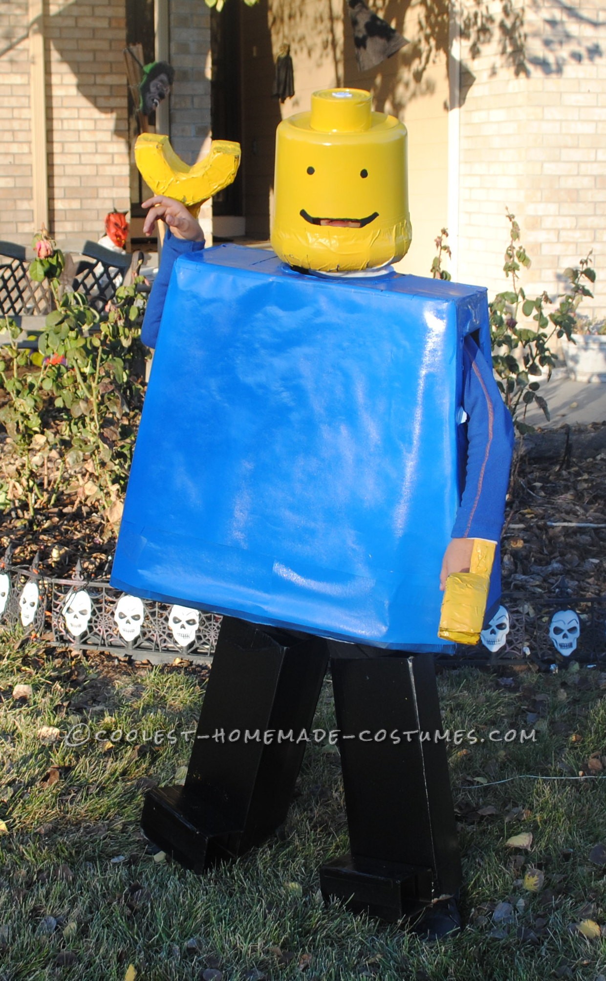 Cardboard Boxes, Yellow and Blue Spray Paint, Plastic Bucket from WalMart and Tuna Can
The hardest part of this costume was getting the head ri