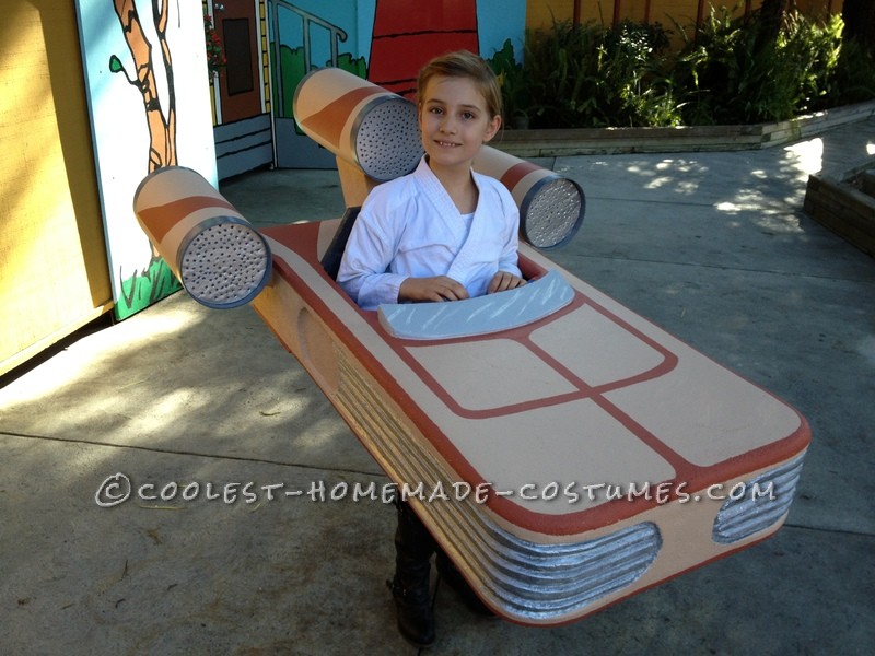 My eight year old daughter is a big Star Wars fan so this year I made her a landspeeder costume.  The vehicle is from Episode 4:  A New Hop