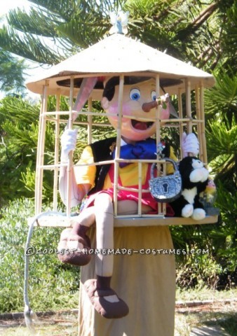 Pinocchio's and his friends Jiminy Cricket, Figaro, and Cleo. I improved on my naughty Pinocchio cage costume by adding a paper mache Pinocchio head