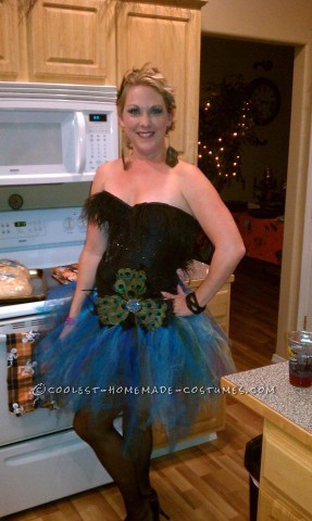 I had a lot of fun making this costume!  I saw a tutu on pinterest and that was my inspiration!  I love the colors of a peacock so I k