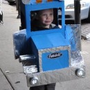 My son was 5 & obsessed with "big trucks".  The only thing he wanted to be for Halloween was a Peterbilt.  So, I used 3 boxes, painte