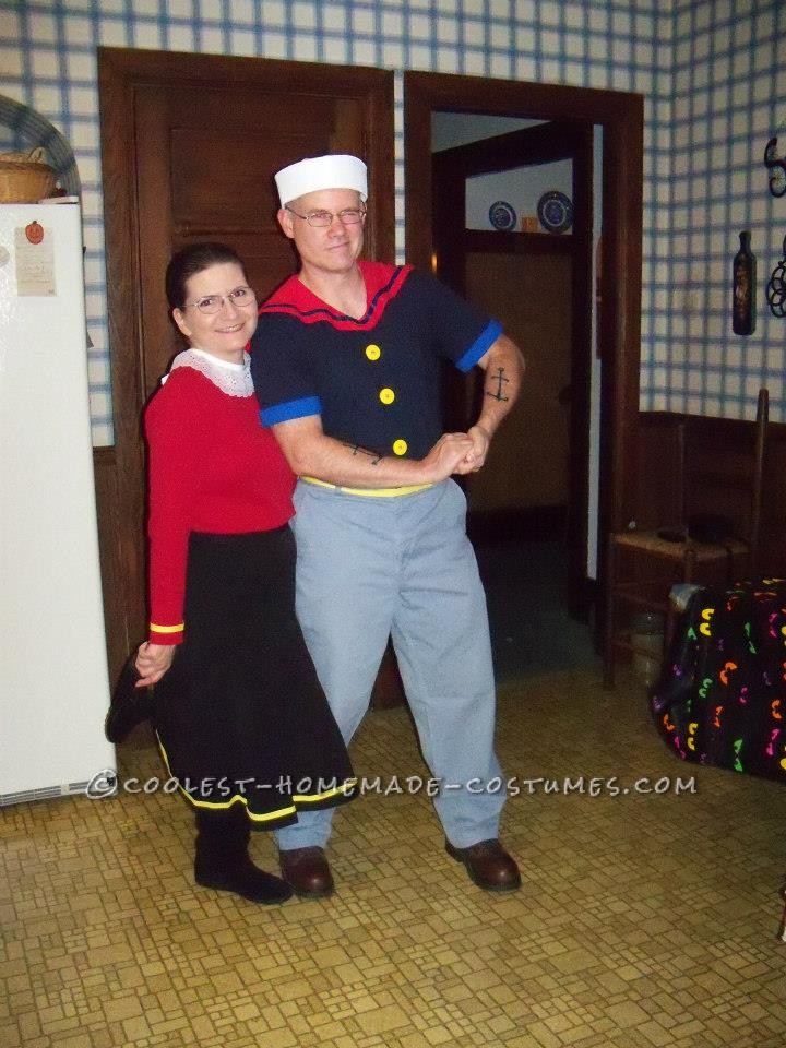 The Popeye costume was a combination of: a simple navy v-neck, a cut-out from a red polo, corn cob pipe, sailor hat, yellow bias tape belt, navy heat