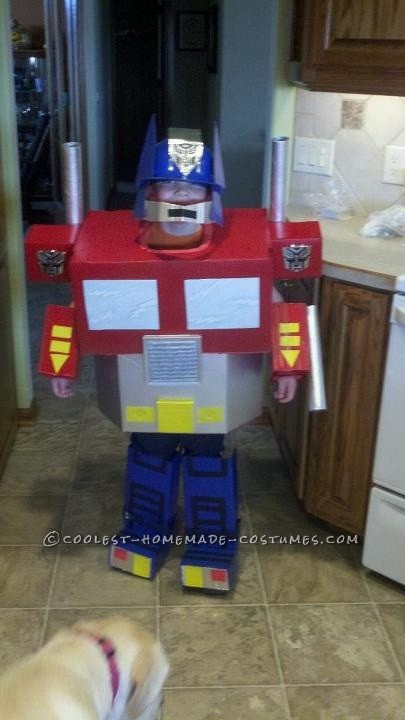 My son loved Transformers, especially Optimus Prime!  So, we decided to attempt making Optimus Prime.   My wife used numerous boxes, paper