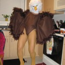 I used several materials. I first got a brown leotard and hot glued on brown feather boas to the back side of the leotard. Then using Fleece fabric a
