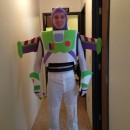 Best Buzz Lightyear Costume Ever!: The main construction of the Buzz Lightyear costume is in a garbage can turned upside down. I then marked up the garbage with the desired shape.  On