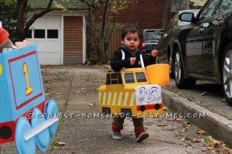 My husband Arsenio made these awesome character costumes for himself and our son, Egon, from scratch by sculpting cardboard.  Egon's a huge Tho