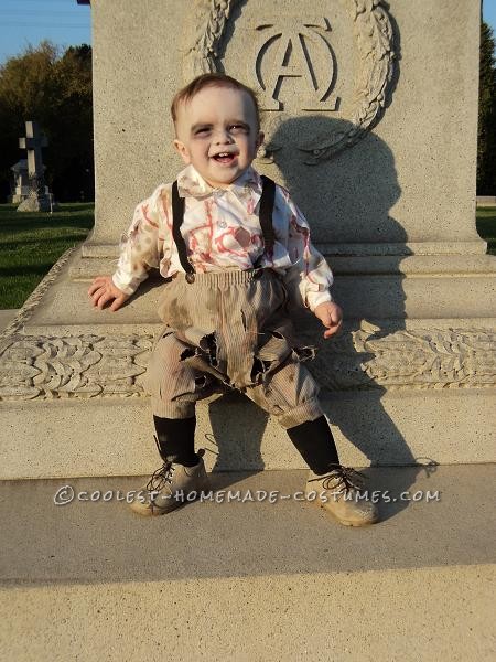 I decided to dress my 12 month old son, Jason, as a zombie after watching him walk around at Magic Mountain Fright Fest and noticing that he walked j