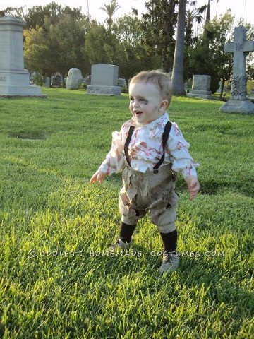 I decided to dress my 12 month old son, Jason, as a zombie after watching him walk around at Magic Mountain Fright Fest and noticing that he walked j