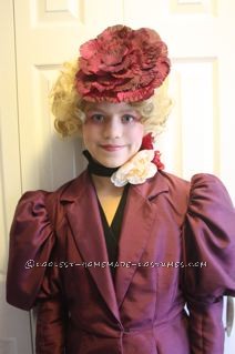 Coolest Effie Trinket from The Hunger Games Girl Halloween Costume : Welcome to the 74th Annual Hunger Games!  May the odds be ever in your favor!  We hope the odds are in our favor this Halloween!  This Hunger Games