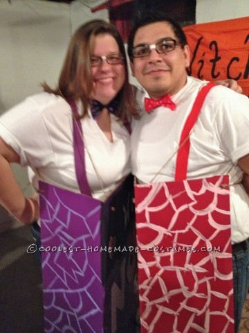 Nerds Couple Halloween Costume: We took two tri-fold presentation boards, 1 red, 1 purple and painted the background with the design of a traditional Nerds box.  We then took a dark