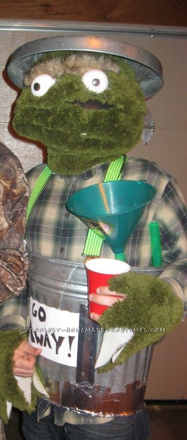 Fun Homemade Oscar the Grouch Halloween Costume: I got most of my materials for Oscar the Grouch costume at Wallmart! The green fur is made out of green bath rugs. I had an old wire hanging flower p