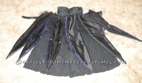 Coolest Homemade Ursula the Sea Witch Costume: I started with a bustier and a crinkle skirt. I bought a ton of black mesh, and made a tutu by tying cut strips to elastic. This sat under the tentacl