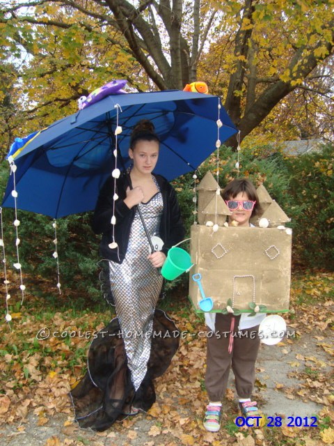 Summertime Dreams of Mermaids and Sandcastles Couple Costume: Prep time for this summertime dreams of Mermaids and Sandcastles couple costume:  6 hours  Costume materials:  sturdy cardboard box, sand, seashe