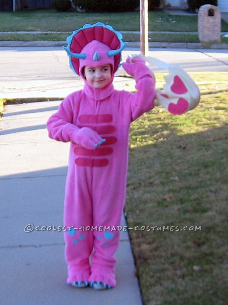 Homemade Pink Triceratops Halloween Costume for a Girl: My niece is a real girly girl most of the time, but she also likes bugs and dinosaurs. When she saw a pattern I had for dinosaur costumes (Simplicity