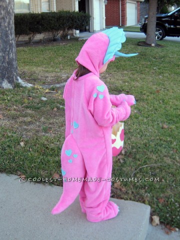 Homemade Pink Triceratops Halloween Costume for a Girl: My niece is a real girly girl most of the time, but she also likes bugs and dinosaurs. When she saw a pattern I had for dinosaur costumes (Simplicity