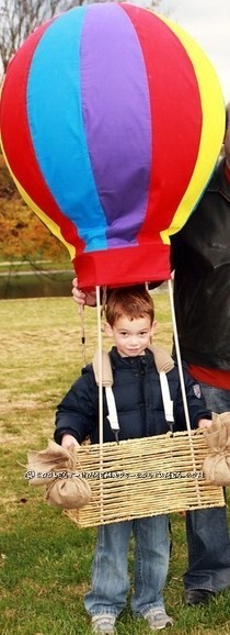 My husband and I decided to once again make our son\'s Halloween costume this year. We had alot of fun doing it. We started with a basket and cut out the bottom.