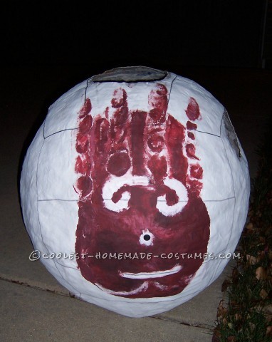 I made this costume by paper macheing a 4 foot beach ball.  I did 5 layers of paper mache, 4 layers with newspaper and the last layer with rippe