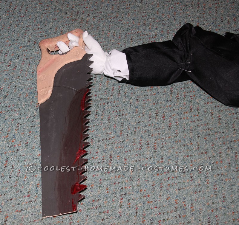 Magician glove with saw attached
