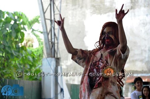 Grotesque Zombie Costume with Bloody Stomach and a Zipper Face