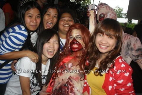 Grotesque Zombie Costume with Bloody Stomach and a Zipper Face