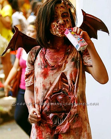 Grotesque Zombie Costume with Bloody Stomach and a Zipper Face