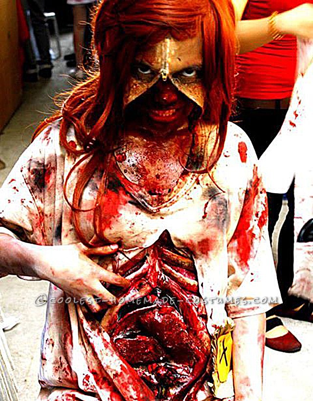 Grotesque Zombie Costume with Bloody Stomach and a Zipper Face