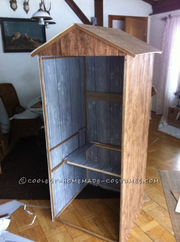 Funny Illusion Costume: Traditional Bavarian Woman Sitting on Wooden Toilet